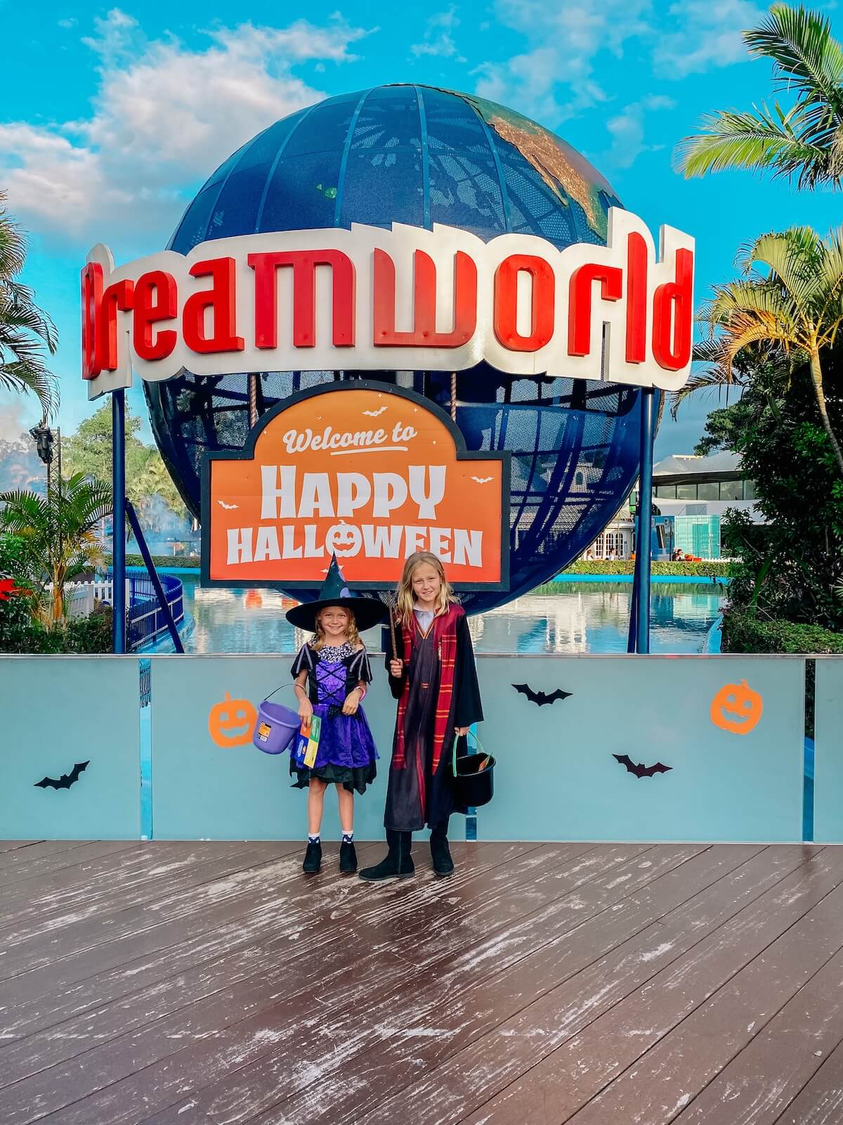 Dreamworld happy halloween event in front of the dreamworld globe.