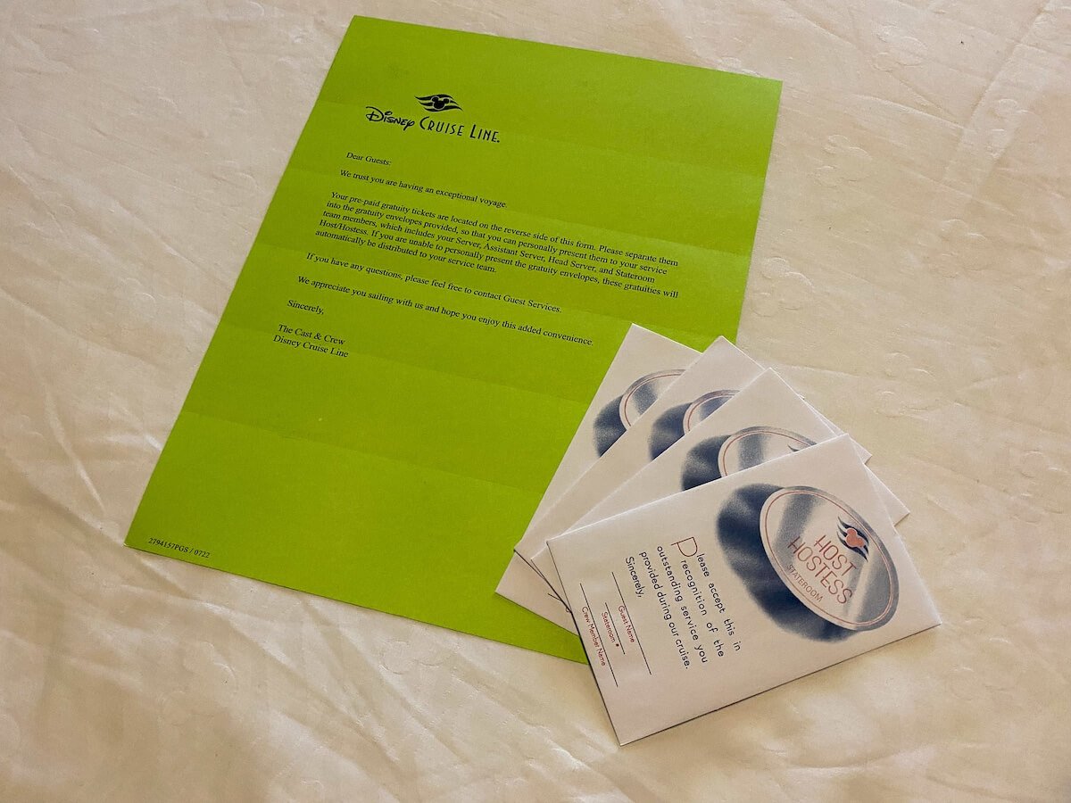 disney cruise pre-paid gratuities letter and envelopes.