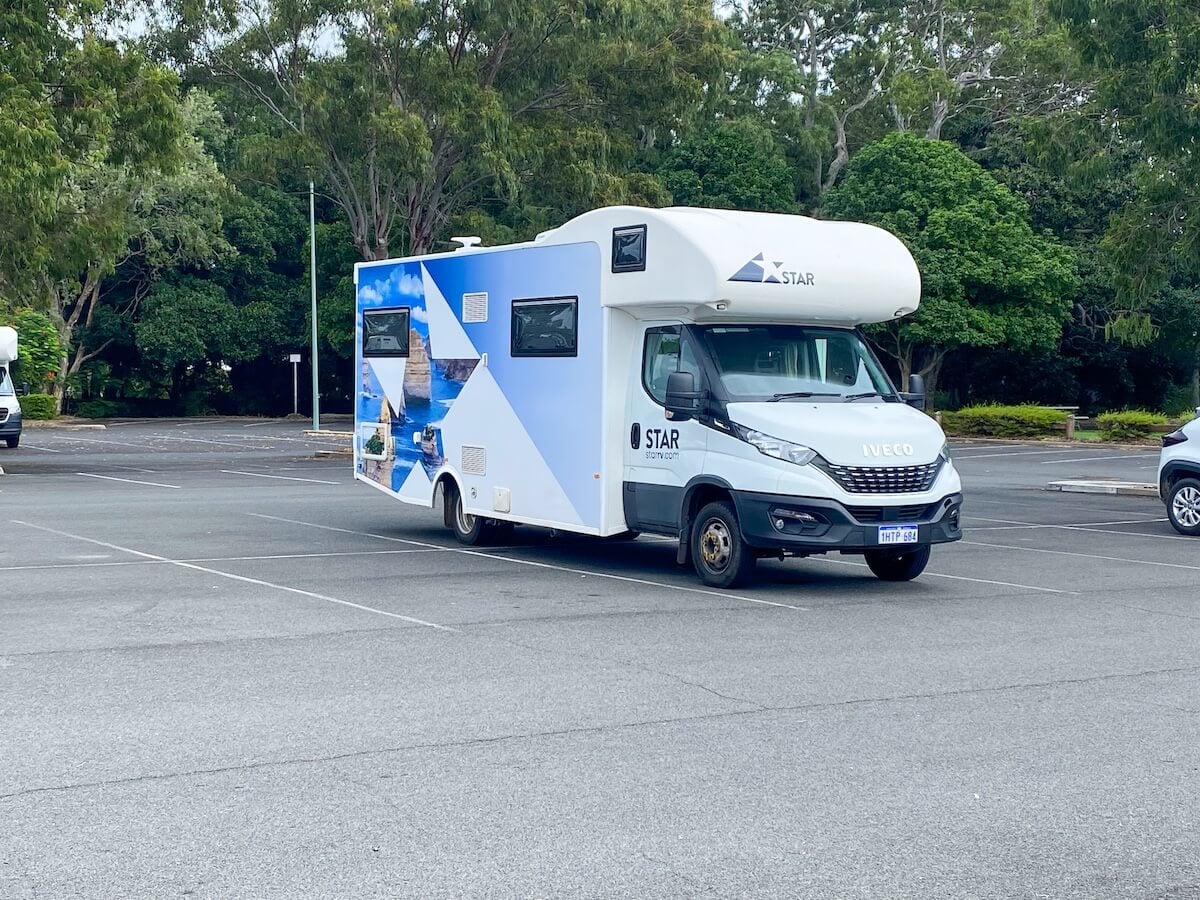 starRV polaris 6 with branded wrapper parked in carpark. 