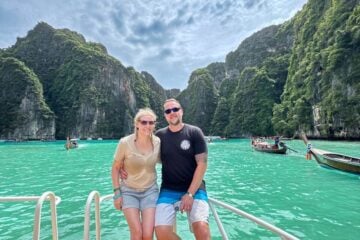 couple having a photo on ship hull in pileh lagoon.