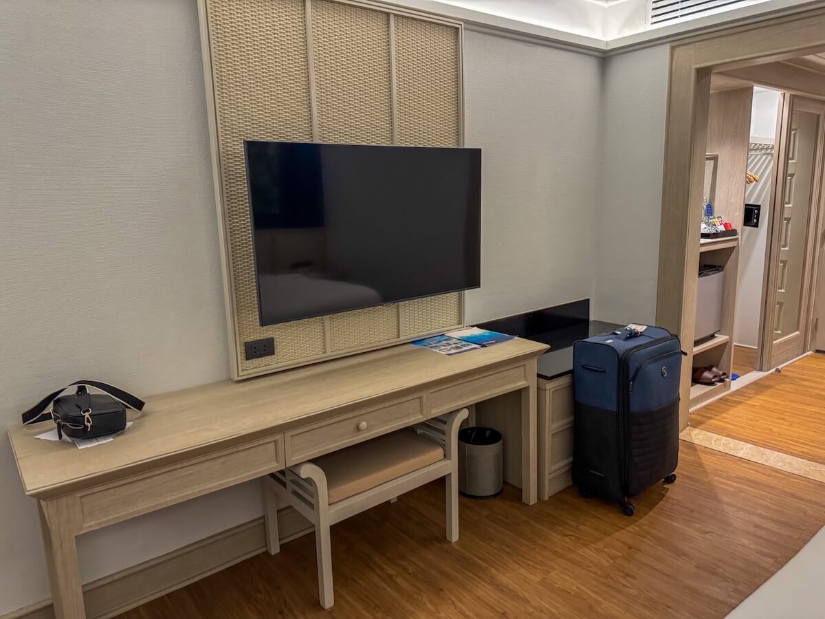 suitcase in hotel room in thailand.
