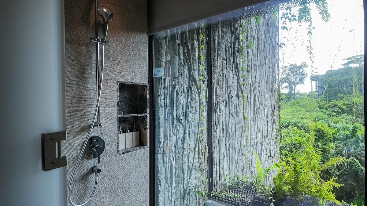 resort shower with glass screen.